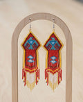 Beaded thunderbird earrings yellow